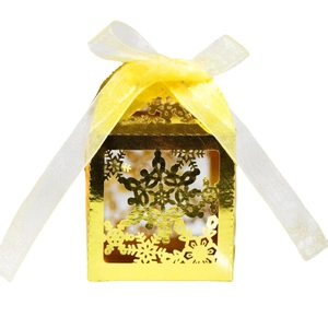 Golden laser cut snowflake gift box with yellow organza ribbon bow for Christmas candy