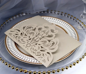 Elegant laser cut hollow floral wedding invitation card in champagne gold pearlescent paper