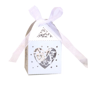 Elegant white laser-cut LOVE heart candy box with ribbon for wedding favors