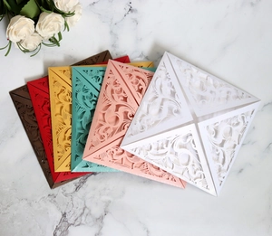 European laser-cut wedding invitations set in elegant colors with pearlescent finish