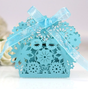 Elegant light blue laser-cut flower candy box with silk ribbon for wedding and party gifts