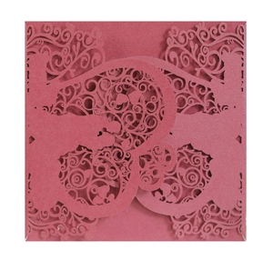 Laser cut wedding invitation card in dark red featuring a romantic couple silhouette