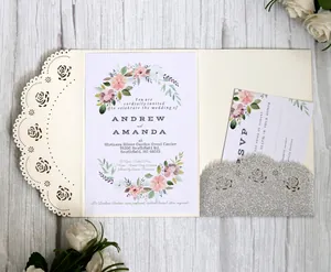 Elegant laser cut rose gold lace wedding invitation set with floral inserts and RSVP card