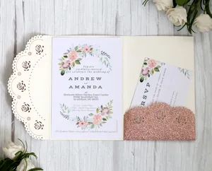 Detail of rose gold glitter pocket and laser-cut hollow lace wedding invitation set