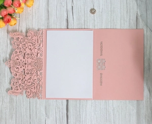 Laser-cut pink wedding invitation card featuring Double Happiness symbol and floral patterns