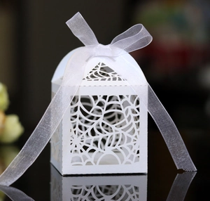 Laser-cut white spider web candy box with elegant organza ribbon for Halloween