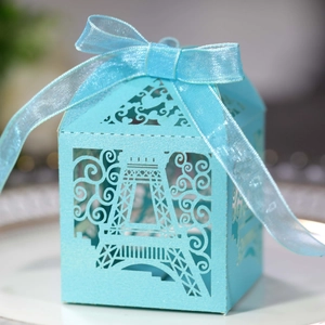 Elegant light blue laser-cut Eiffel Tower candy favor box with matching silk ribbon bow