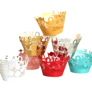Laser cut lace cupcake wrappers with LOVE pattern in various colors for weddings