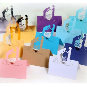 Laser cut Mr & Mrs heart place cards in multiple colors for wedding table settings