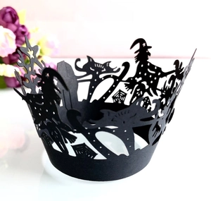 Detailed laser-cut Halloween cupcake wrapper featuring witch and castle patterns