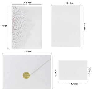 Laser-cut white rose wedding invitation set with envelope, inner sheet, and gold seal