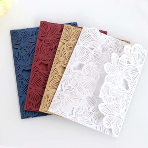 Laser cut floral wedding invitation envelopes in navy, burgundy, gold and white