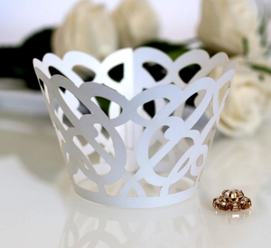 Elegant white laser cut cupcake wrappers with floral vine lace for wedding party decoration