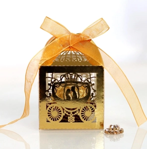 European laser-cut golden horse carriage wedding candy box with orange silk ribbon bow