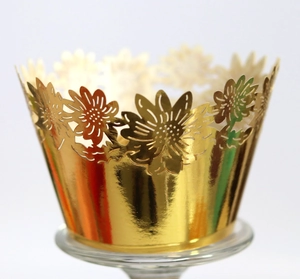 Laser cut golden sunflower cupcake wrapper with metallic hollow design for weddings