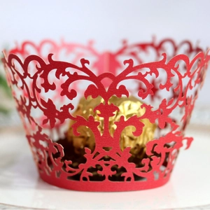Red laser-cut vine lace cupcake wrapper with decorative hollow pattern for weddings