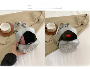 Detailweergave van de zilveren pailletten rugzak binnenzijde en capaciteit voor items