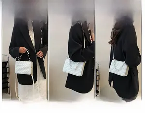Detailed views of a white quilted shoulder bag used as handbag, shoulder, and crossbody