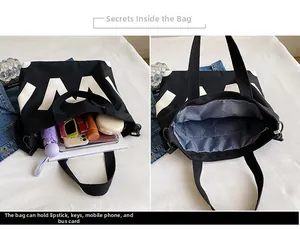 Detail view of the spacious black canvas tote bag interior with storage compartments