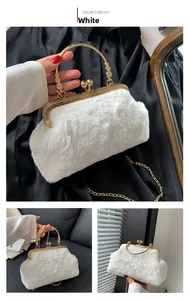 Detailed view of white faux fur handbag featuring a vintage gold metal frame and chain strap