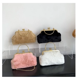 Plush faux fur handbags in four colors with vintage metal frames and ball clasps
