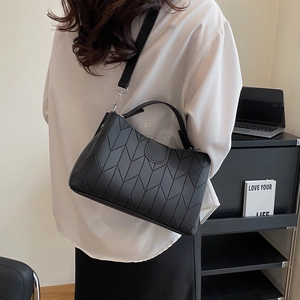 Women's black faux leather handbag with geometric herringbone pattern for daily commute