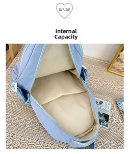Detail view of the large capacity interior of this light blue water-resistant backpack