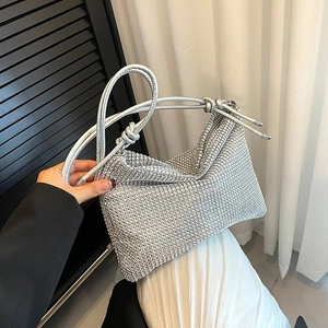 Elegant silver rhinestone hobo bag with sparkling finish and knotted cord handle