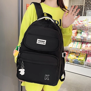 Waterproof black nylon backpack with 3 zipper pockets and fashion tag in casual style