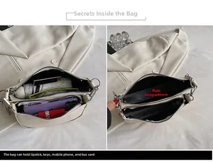 Detailed interior of double-zipper saddle bag showing dual compartments for essentials