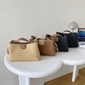 Fashionable minimalist women's tote bags in four colors with geometric embossed textures