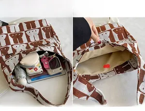 Interior view showing large capacity for umbrella, tablet and phone in rabbit knit bag