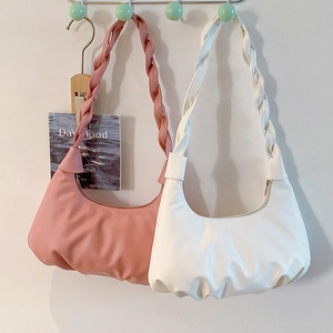 French style pleated hobo bag with braided strap and soft leather finish in pink and cream