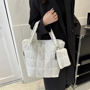 White quilted puffer tote bag set with matching pouch and wide shoulder straps