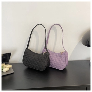 Chic quilted underarm bags in black and lavender with elegant rhombus stitching detail