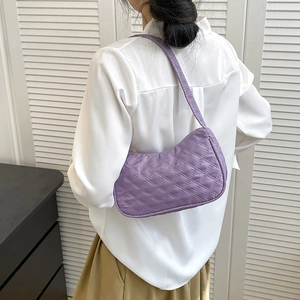 Chic purple quilted shoulder bag with a stylish half-moon silhouette for women