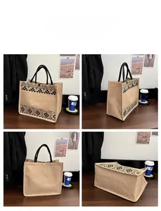 Detail view of large linen tote bag showing ethnic geometric patterns and sturdy base