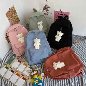 Minimalist nylon backpack set in five colors with cute white plush bear pendants