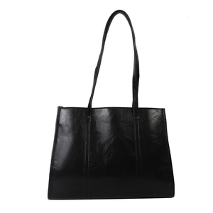 Classic black oil wax leather tote bag with long shoulder straps for work and daily commuting