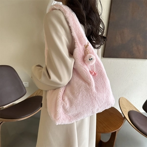 Pink plush faux fur shoulder bag for women with cute pom-pom doll charm detail