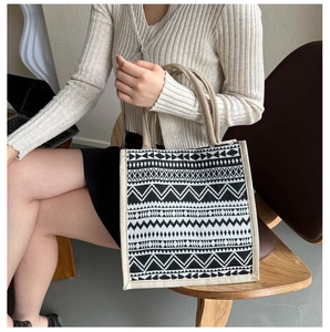 Detail view of retro geometric print linen tote bag with sturdy rope handles