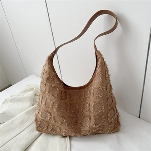 Grand sac fourre-tout en toile à motif de grille effiloché et bordures en cuir
