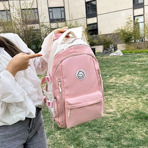 Zaino per studenti rosa e bianco con toppa smiley e grande capacità per scuola e viaggi