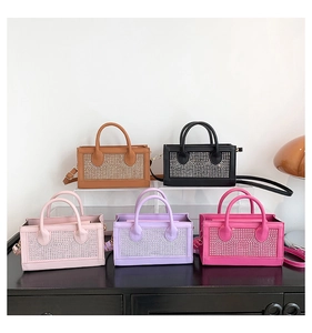 Detailed view of mini PU tote bags in five colors with sparkling rhinestone embellishments