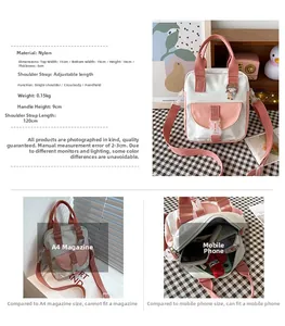 Detail view of pink and white canvas bag with dimensions 15x18x5cm and adjustable strap