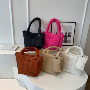 Chic quilted cloud tote bags in five colors with matching mini pouches for women