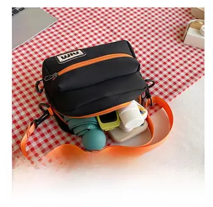Interior view showing spacious compartments for umbrella and phone in canvas bag