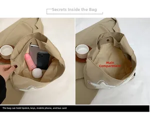 Detailed view showing the spacious interior of the canvas tote bag with star patch