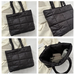 Detailed views of the large black quilted tote bag with padded stitch texture