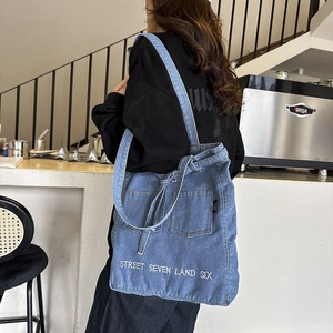 Fashionable denim tote bag with street embroidery and dual front pockets for women